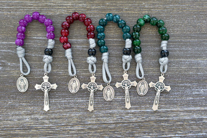 Gemstone Colored - 1 Decade Paracord Rosary in Garnet Red, Emerald Green, Ingolite Blue, and Magenta colors, perfect for adults and children as a spiritual weapon for life's battles.