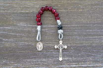 Gemstone Colored - 1 Decade Paracord Rosary: Available in Garnet Red, Emerald Green, Ingolite Blue or Magenta, featuring paracord 550, 12mm acrylic beads, Miraculous Medal devotional medal and a 2-inch St. Benedict Crucifix.