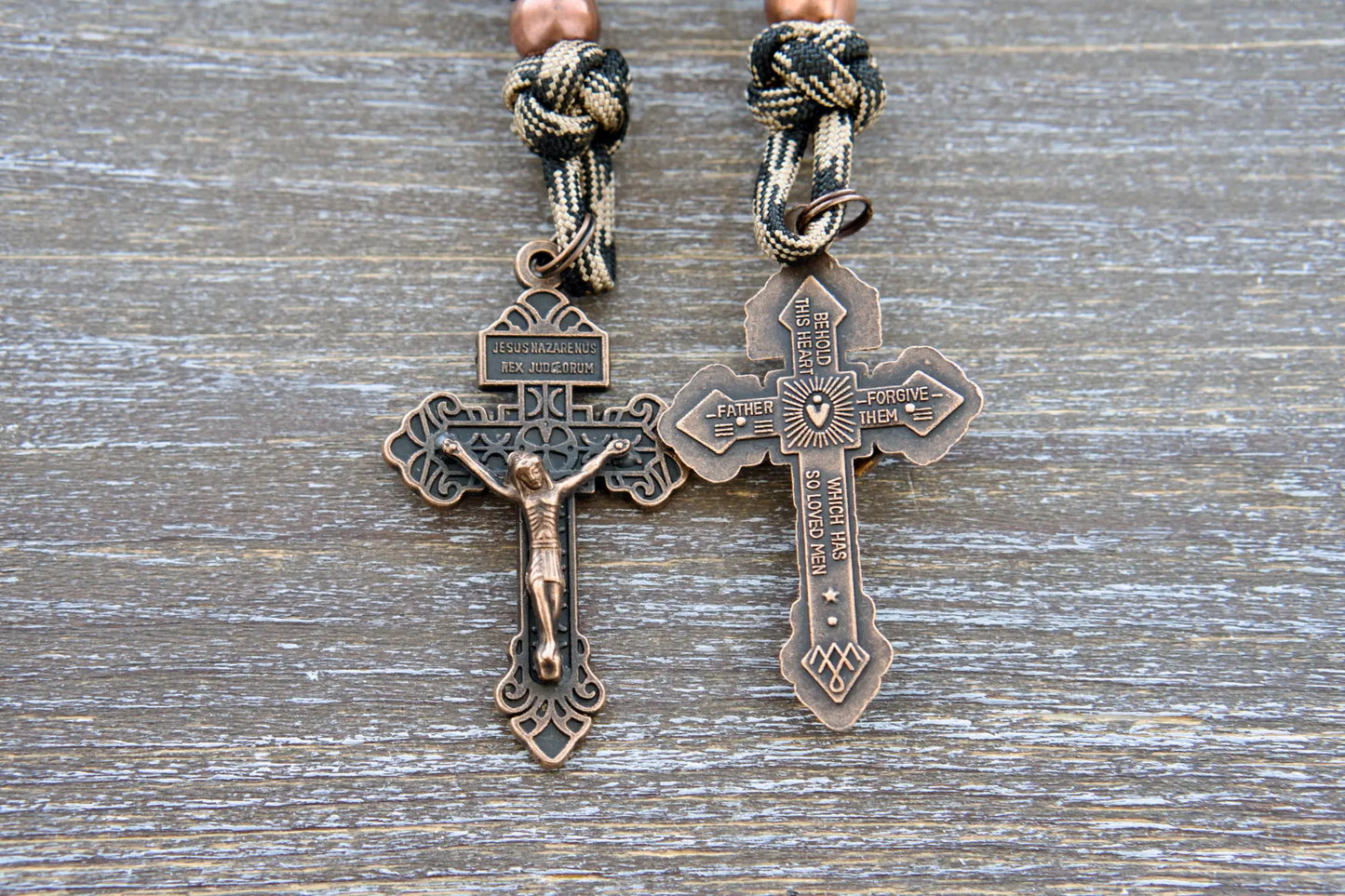 Heavy Duty Hail Mary rearview mirror rosary with camo black paracord, matte black beads, antique copper Our Father beads, and a copper Pardon crucifix.