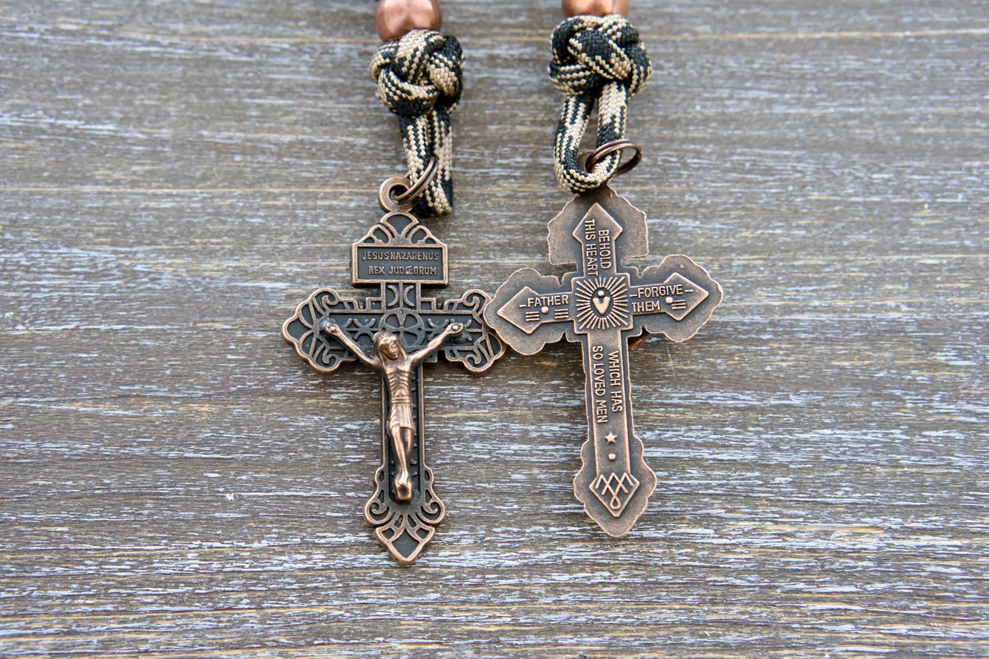 Heavy Duty Hail Mary rearview mirror rosary with camo black paracord, matte black beads, antique copper Our Father beads, and a copper Pardon crucifix.