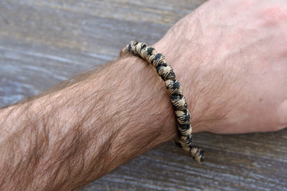 Heavy Duty Hail Mary rosary bracelet: black/brown camo paracord, 12mm and 10mm acrylic beads, secure knots for each Hail Mary prayer.