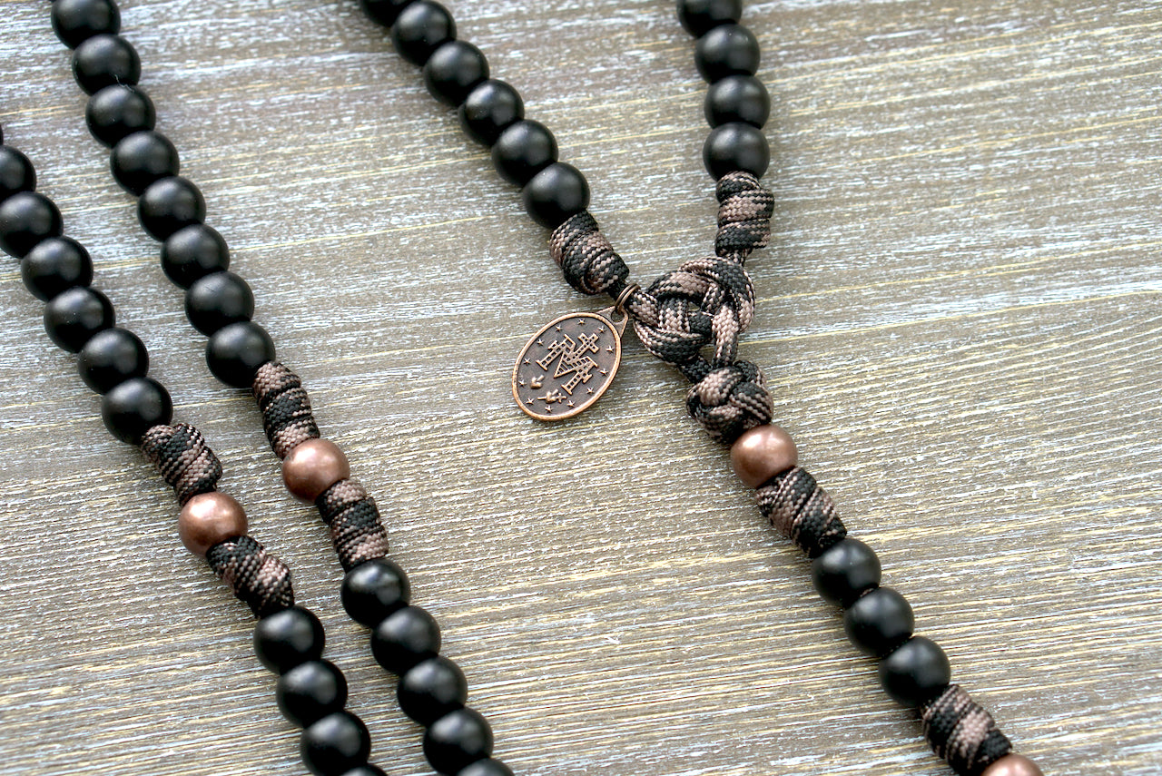 Heavy Duty Hail Mary - 5 Decade Paracord Rosary with Black Enamel St. Benedict Crucifix, 12mm Acrylic Beads, and Copper & Coffee Camo-Inspired Paracord Rope.