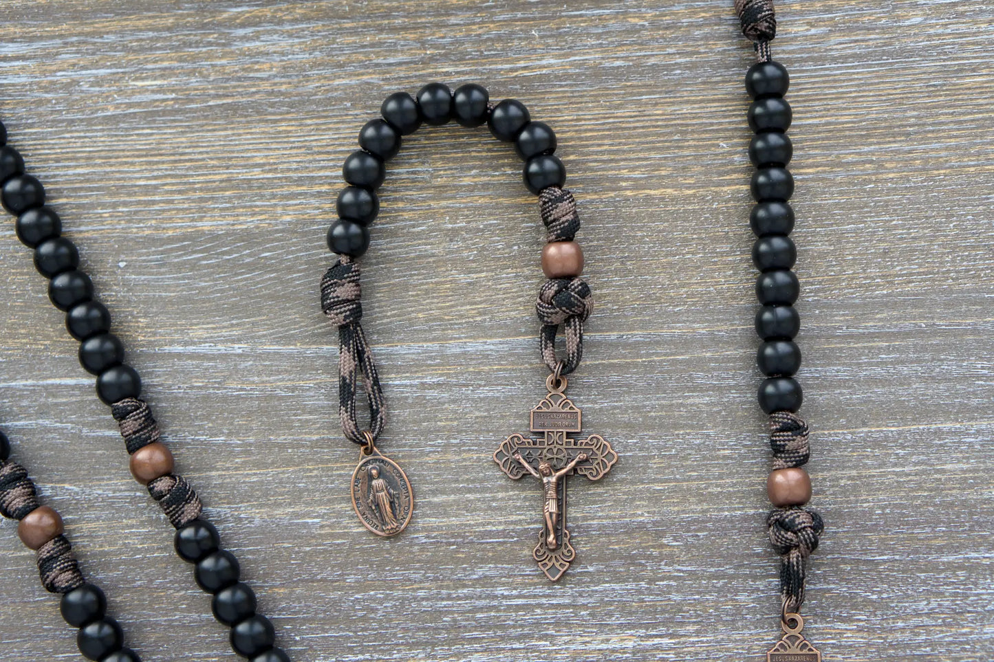 Heavy Duty Hail Mary Pocket Rosary: matte black acrylic Hail Mary beads, antique copper Our Father bead, crucifix, and Miraculous medal on paracord 550 cord.