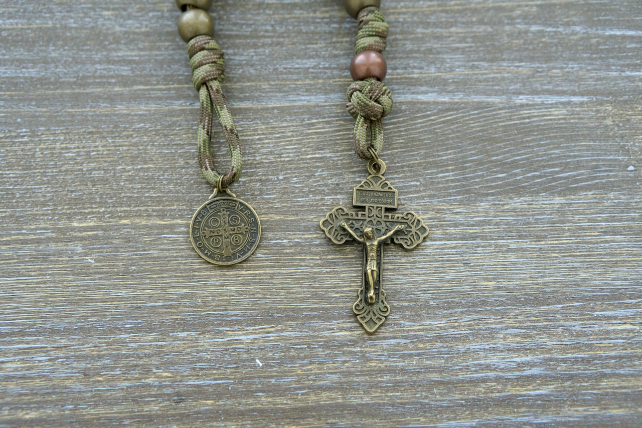 Holy Defense - Pocket Paracord Rosary: Premium camo paracord rosary with antique copper Our Father beads, olive green Hail Mary beads, 1-inch St. Benedict medal, and a stunning 2-inch olive green Pardon Crucifix for powerful spiritual support on-the-go.