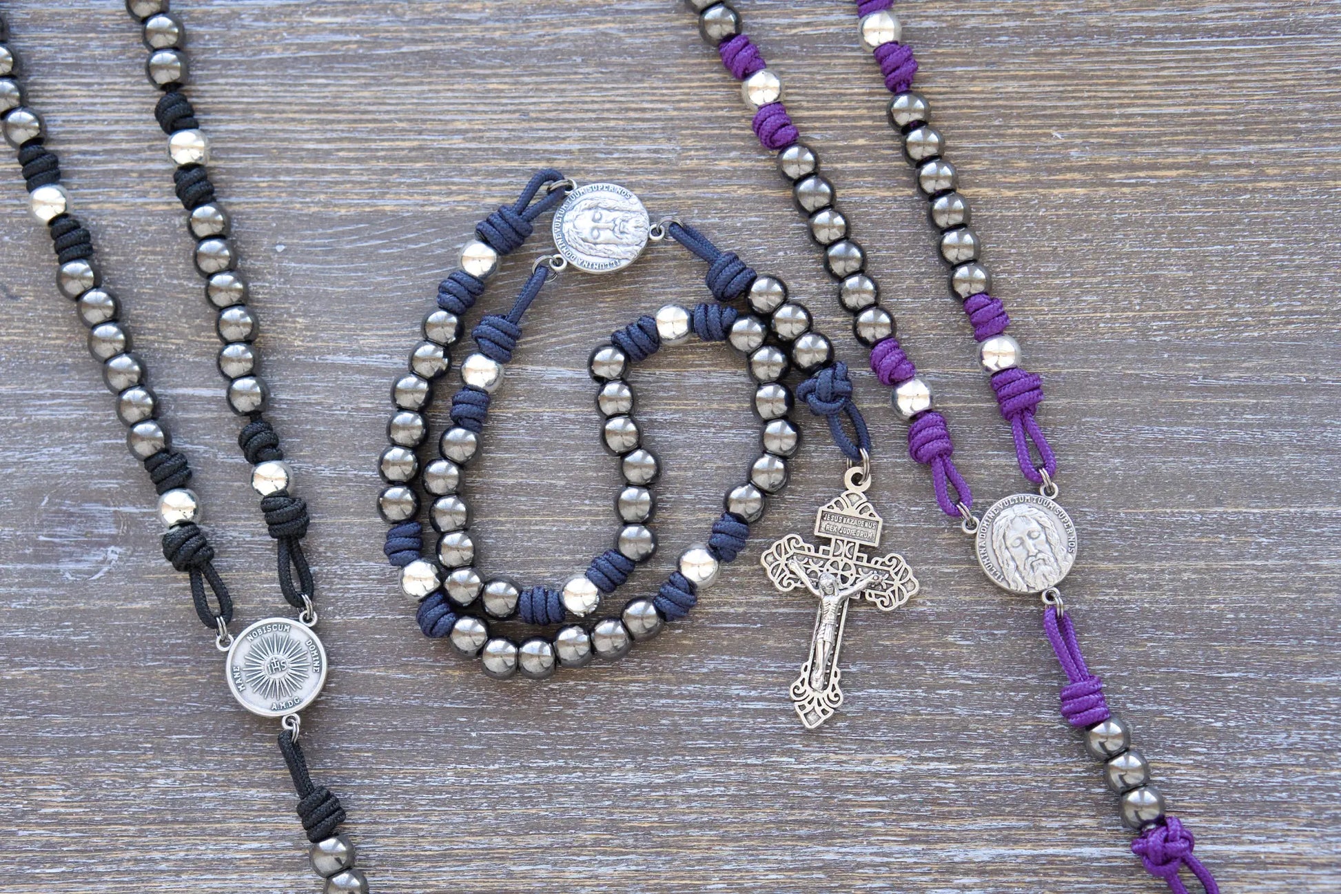 Holy Face Chaplet with maroon paracord, metal beads, and "Illumina Domine Vultum Tuum Super Nos" centerpiece, 2-inch Pardon Crucifix attached
