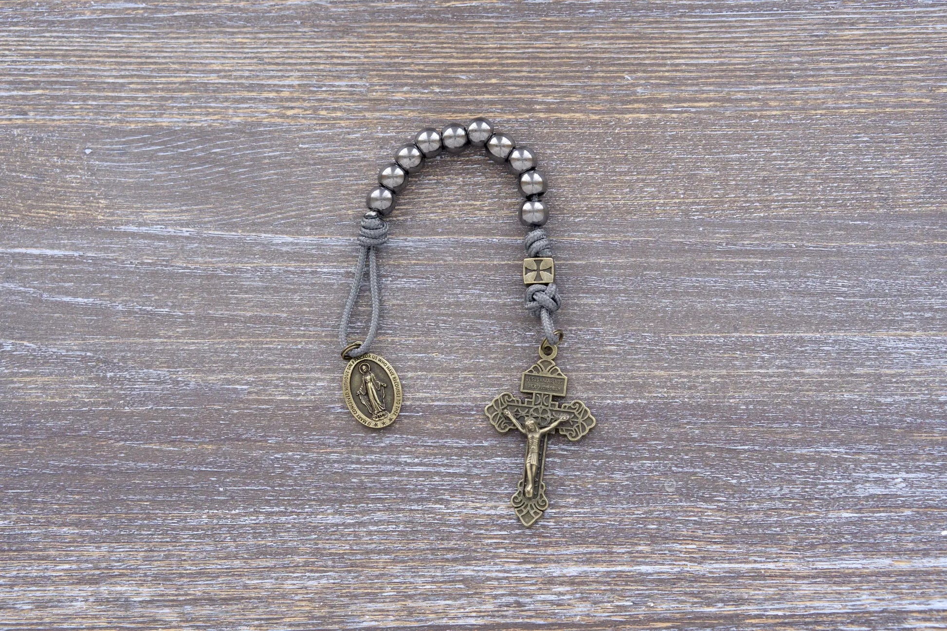 Iron Crusader pocket paracord rosary in iron grey, olive crucifix, metal beads, Miraculous Medal.