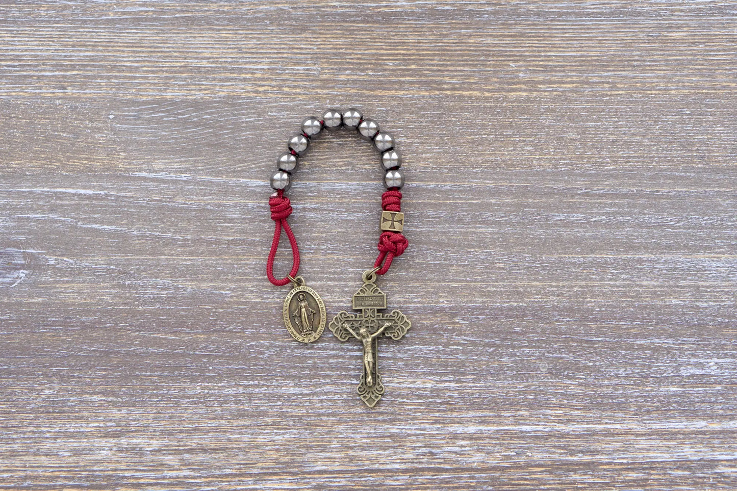 Iron Crusader pocket paracord rosary in maroon, olive crucifix, metal beads, Miraculous Medal.