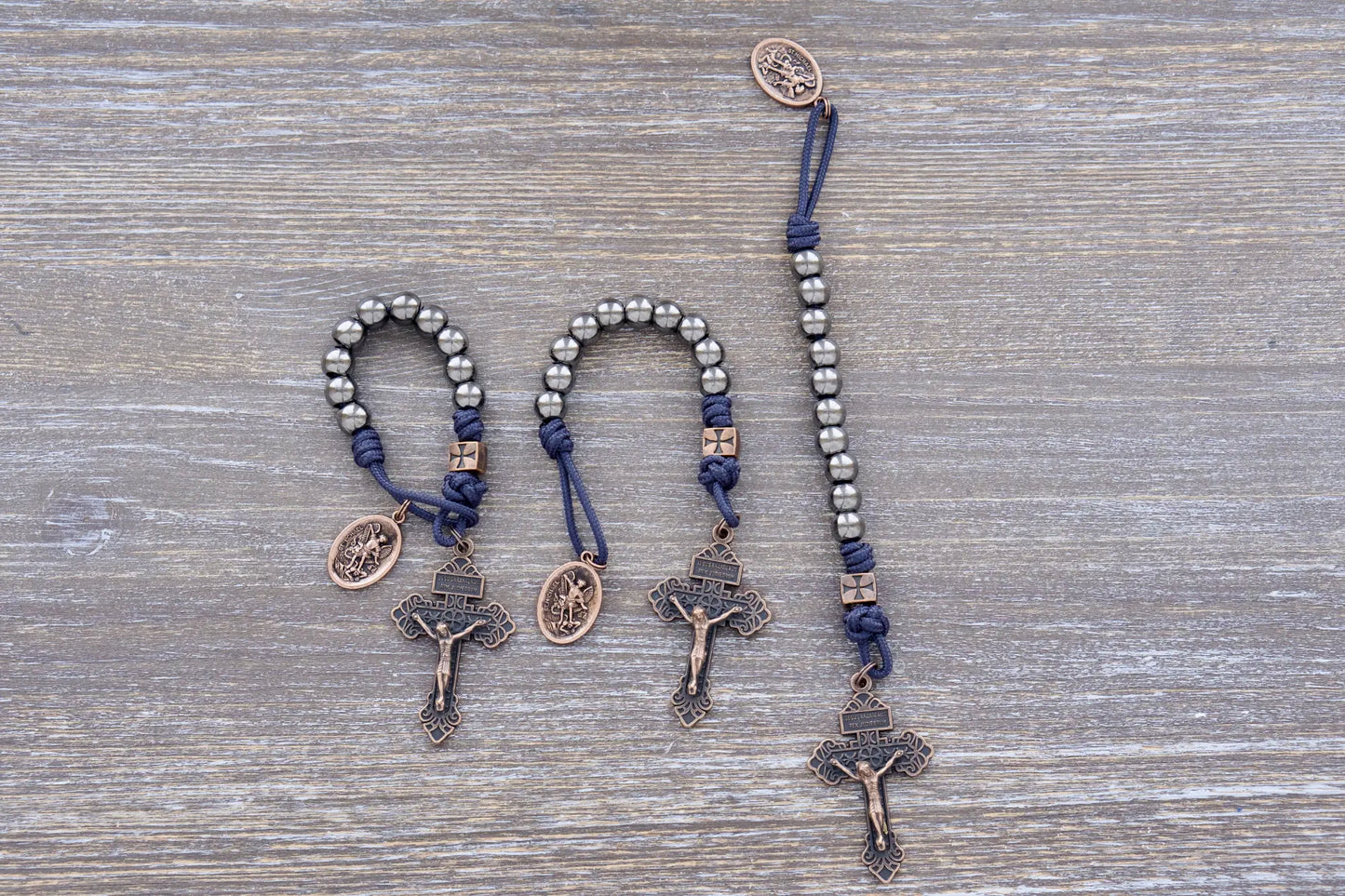 Iron Legion Premium Metal Paracord Rosary with copper crucifix and medal, navy or black rope, durable alloy beads.