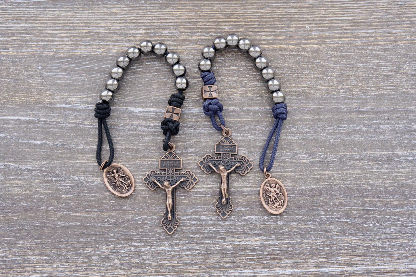 Iron Legion Pocket Paracord rosaries made with metal alloy beads available in Navy blue or black rope, made with copper Pardon Crucifix and medal.