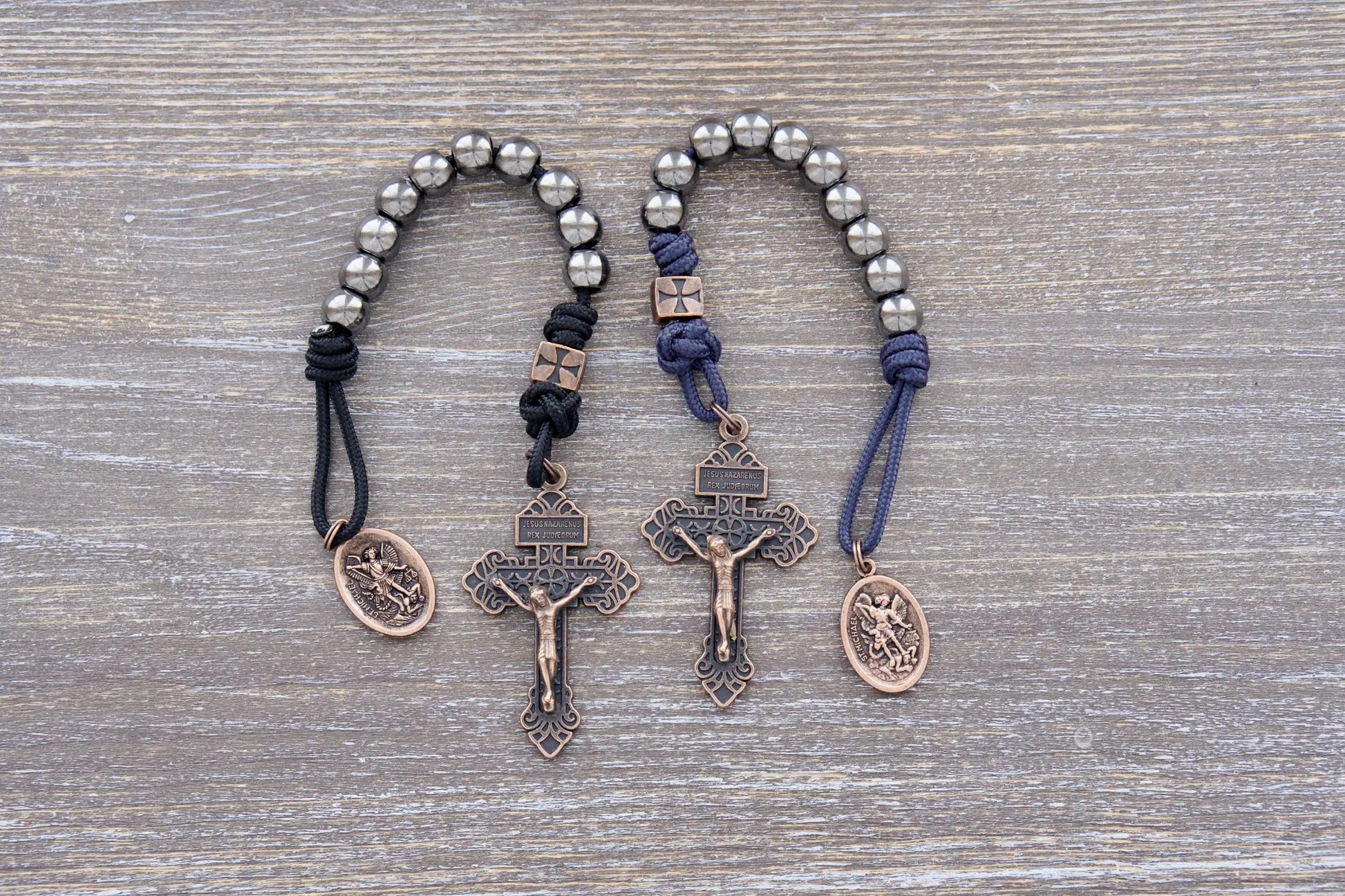 Iron Legion Pocket Paracord rosaries made with metal alloy beads available in Navy blue or black rope, made with copper Pardon Crucifix and medal.