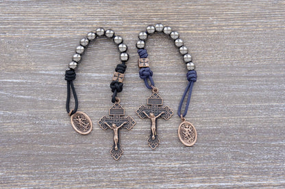 Iron Legion Pocket Paracord rosaries made with metal alloy beads available in Navy blue or black rope, made with copper Pardon Crucifix and medal.