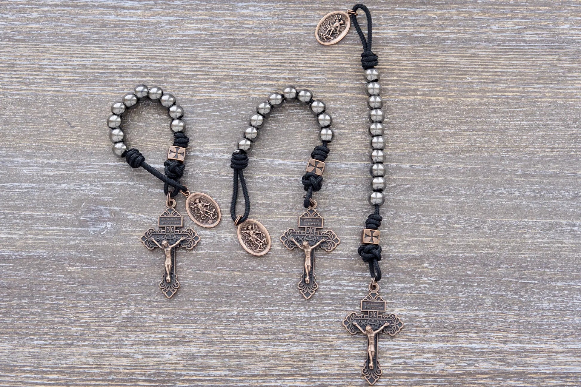 Iron Legion Premium Metal Paracord Rosary with copper crucifix and medal, navy or black rope option.