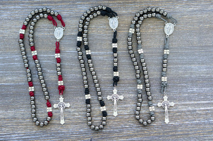 Last Stand Rosary: Gunmetal Hail Mary beads, silver crusader Our Father beads, red, black, gray paracord, and a St. Benedict crucifix.