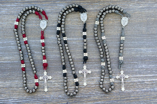 Last Stand Rosary: Gunmetal Hail Mary beads, silver crusader Our Father beads, red, black, gray paracord, and a St. Benedict crucifix.