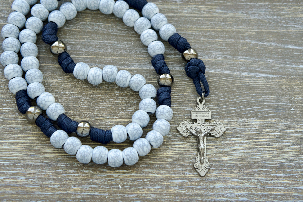 Marian Stronghold - Unbreakable Navy Blue Paracord Rosary with Gunmetal & Cracked Ivory Beads, Blue Enamel Miraculous Medal, and 2-inch Pardon Crucifix.