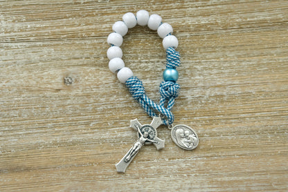 Mater Boni Consilii (Our Lady of Good Counsel) - Teal Blue and White - 1 Decade Pocket Paracord Rosary - Unbreakable paracord rosary featuring durable teal blue and white striped rope, Mater Boni Consilii/Holy Trinity devotional medal, and a 2-inch St. Benedict crucifix