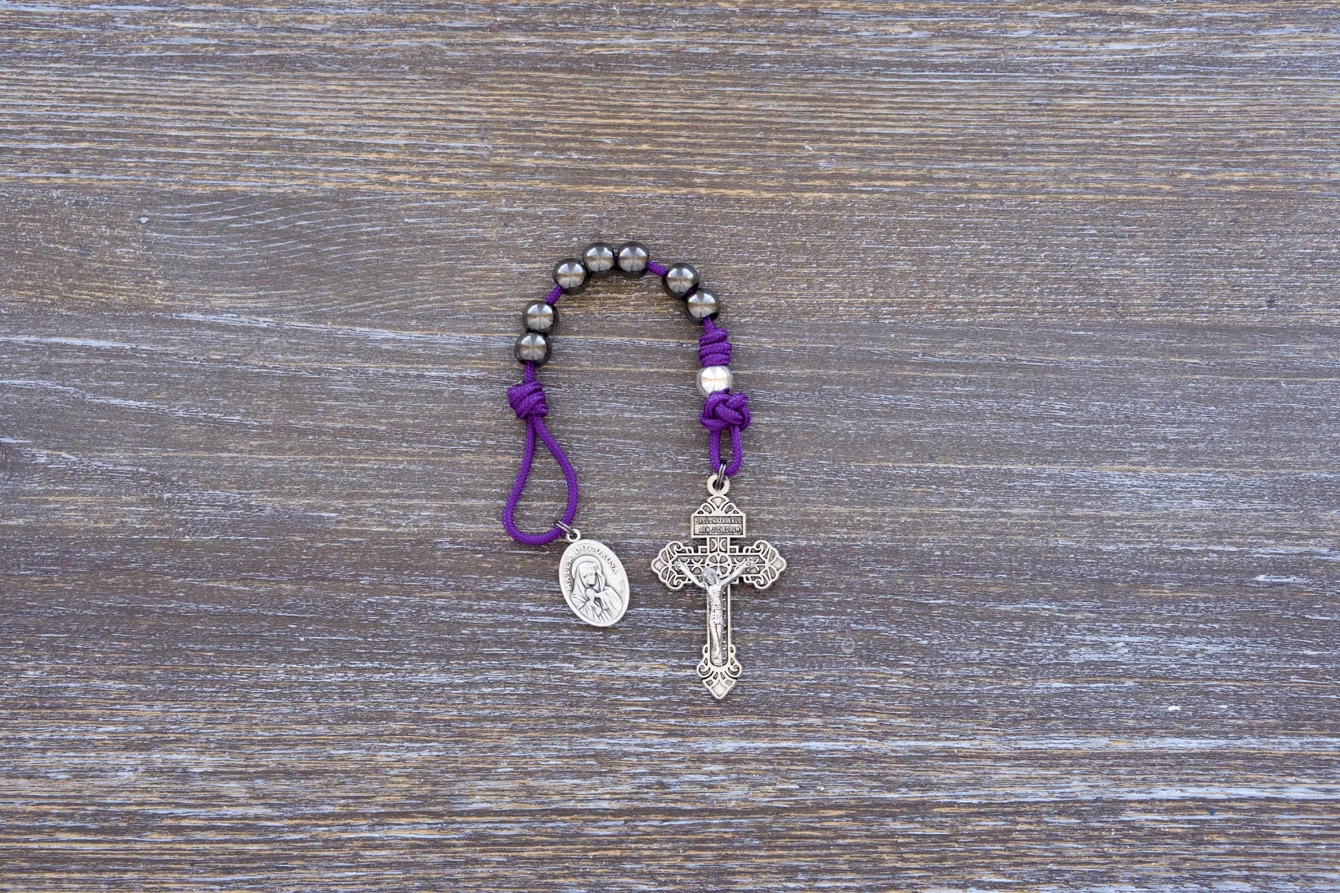 7 Sorrows Servite Pocket Rosary in purple with metal beads and Mater Dolorosa medallion