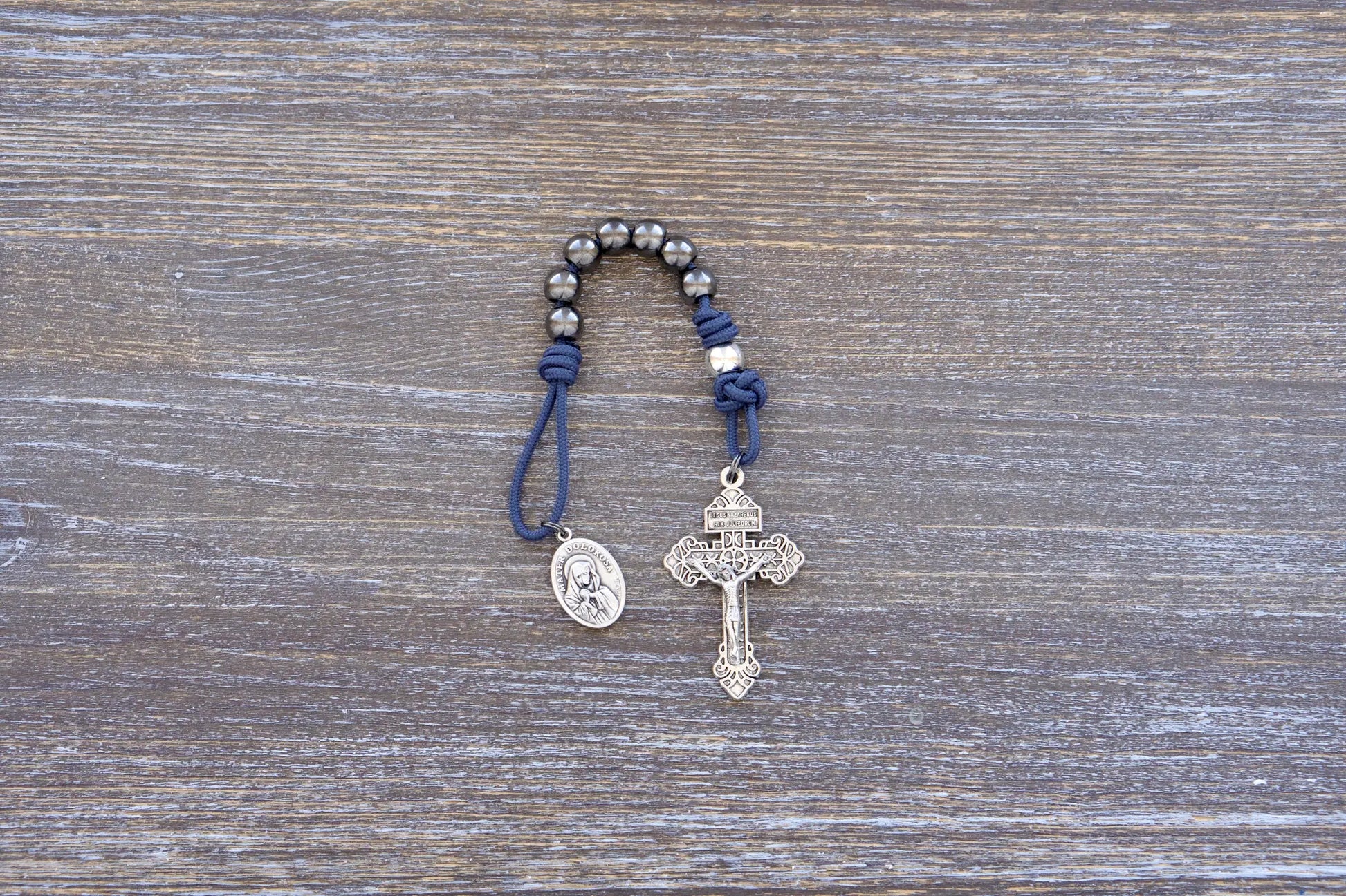 7 Sorrows Servite Pocket Rosary in navy blue with metal beads and Mater Dolorosa medallion