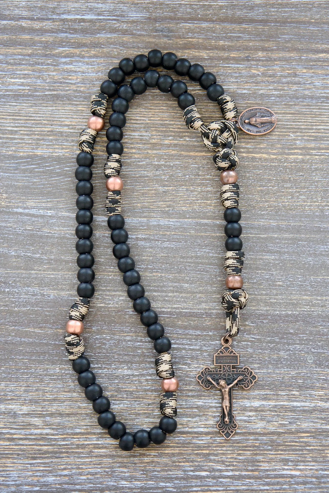 Mini Duty Hail Mary paracord rosary in camo black with 10mm matte beads and copper crucifix for children.