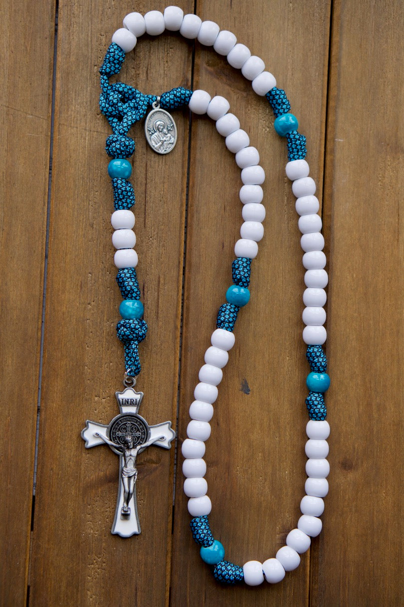 Our Lady of Perpetual Help - Turquoise - 5 Decade Paracord Rosary: A powerful spiritual weapon infused with divine protection. This durable and unbreakable paracord rosary features a beautiful design, premium beads, and a large St. Benedict Crucifix.