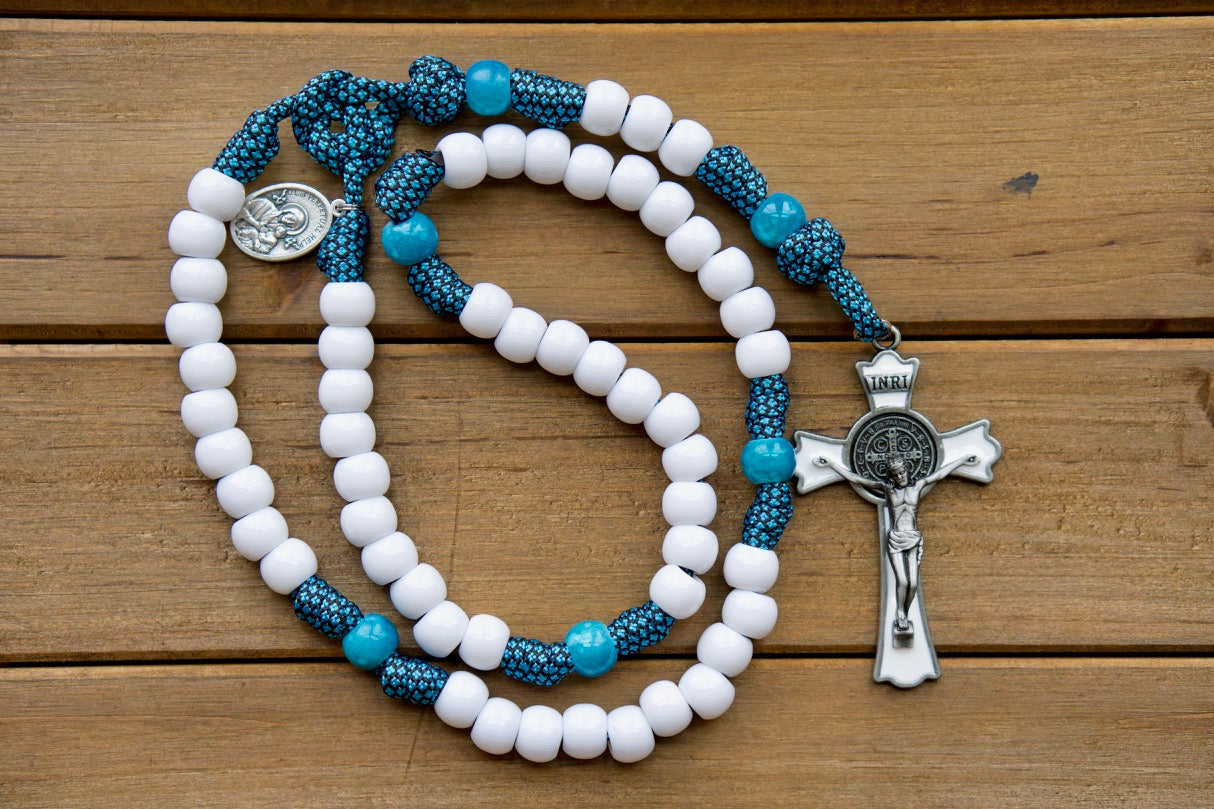 Our Lady of Perpetual Help - Turquoise - 5 Decade Paracord Rosary: A premium, unbreakable Catholic gift featuring the powerful image of Our Lady of Perpetual Help, with white Hail Mary beads and matching turquoise Our Father beads. 