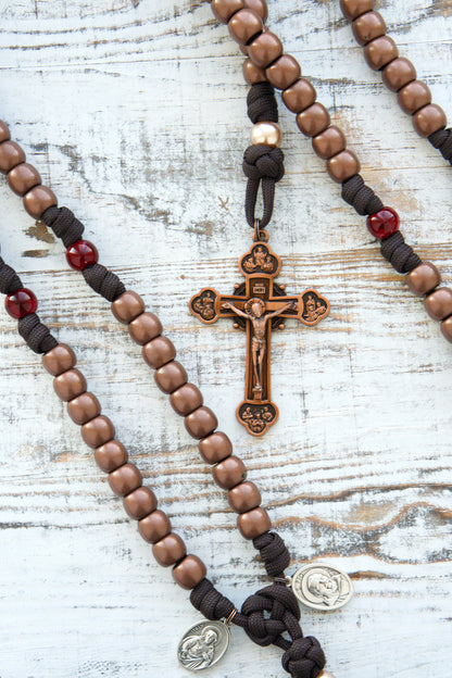 St. Padre Pio's Intercession - 5 Decade Paracord Rosary in Brown, Red and Antique Copper with Stigmata-inspired Our Father beads, Sacred Heart of Jesus and St. Padre Pio devotional medals, and a heavy duty copper Crucifix.