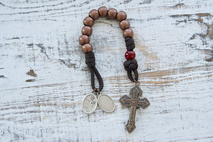 St. Padre Pio's Intercession - 1 Decade Paracord Rosary in Brown, Red and Antique Copper, featuring devotional medals, Stigmata-inspired Our Father bead, and a copper Pardon Crucifix. Perfect for deepening faith and honoring the beloved Saint.