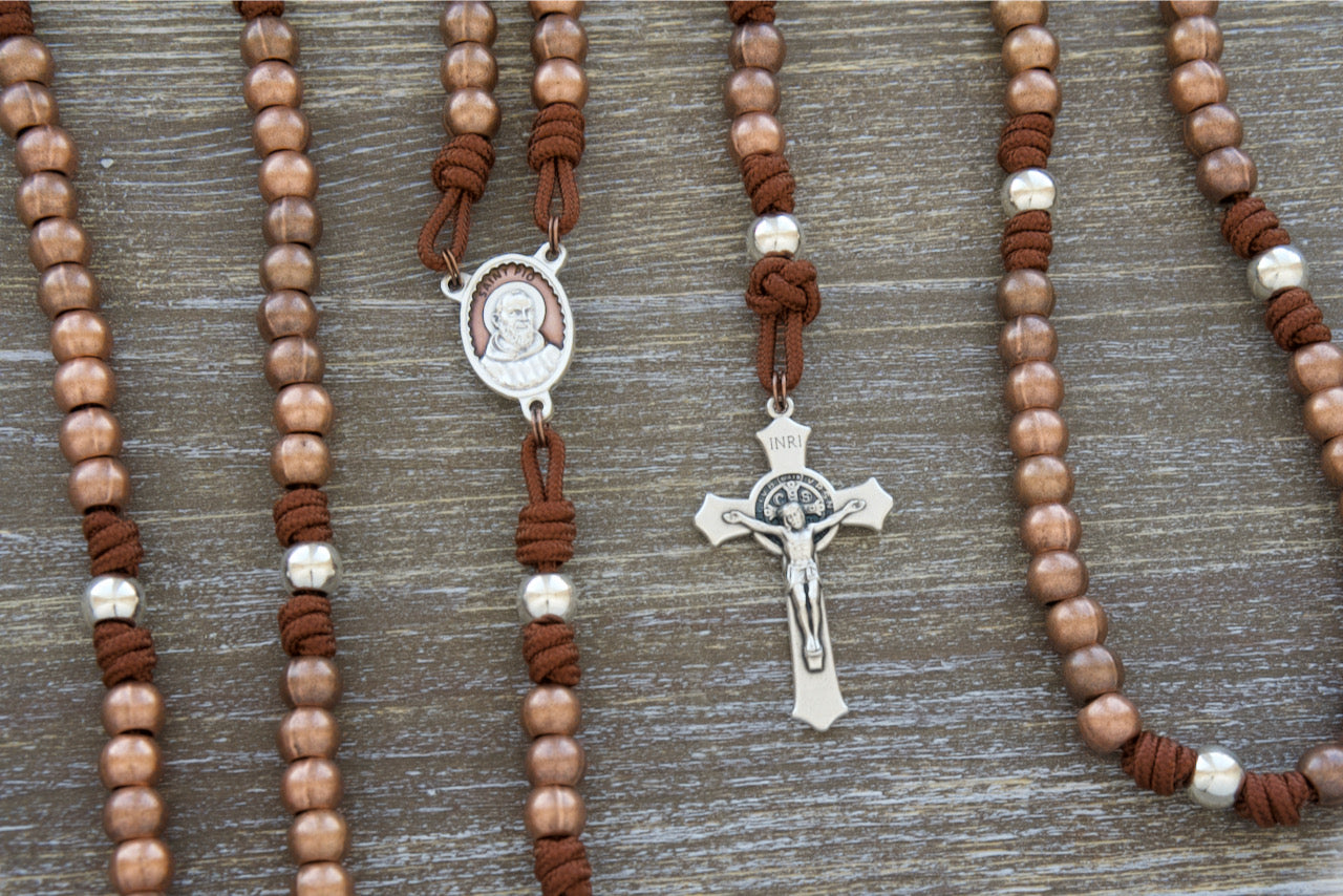 Handcrafted St. Padre Pio Stainless Steel Paracord Rosary with Antique Copper Hail Mary Beads, Shiny Silver Our Father Beads, Brown Enamel Medal, 2" St. Benedict Crucifix, and Durable Paracord. Catholic Gift for Spiritual Journey and Prayer. Handmade by Sanctus Servo's Small Catholic Family.
