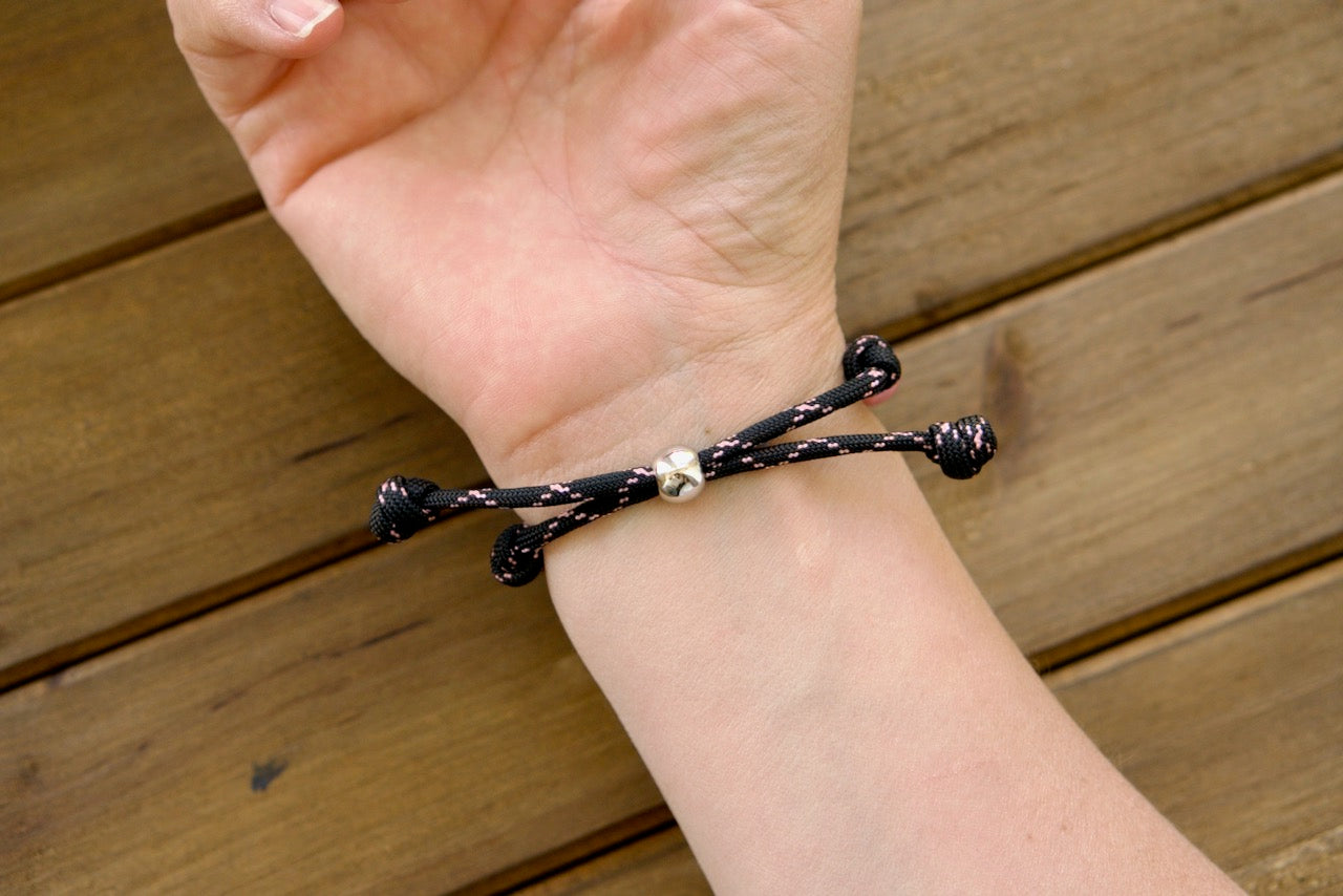 Pink and Black Rosary Bracelet - Handcrafted Premium Quality Unbreakable Paracord Catholic Accessory with Vibrant Pink and Black Accents, Perfect for Daily Use and as an Inspiring Gift.