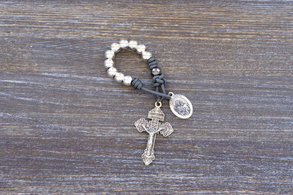 Protector of Holy Church Pocket Paracord Rosary - featuring gray paracord rope, silver metal alloy beads, pardon crucifix and St. Joseph medal.
