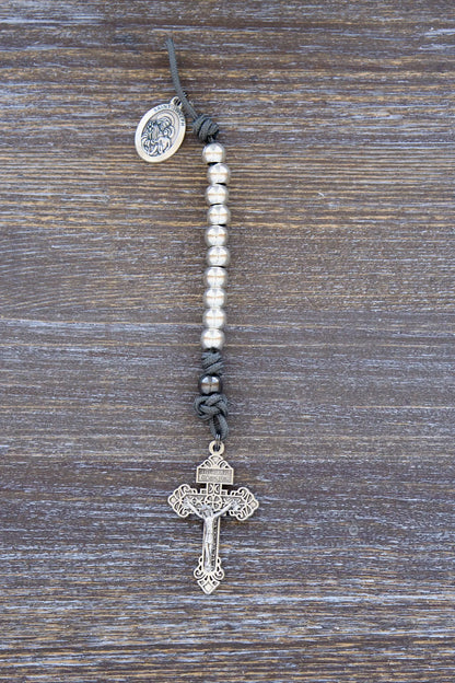 Premium metal paracord rosary with gray rope, silver beads, St. Joseph medal, and pardon crucifix.