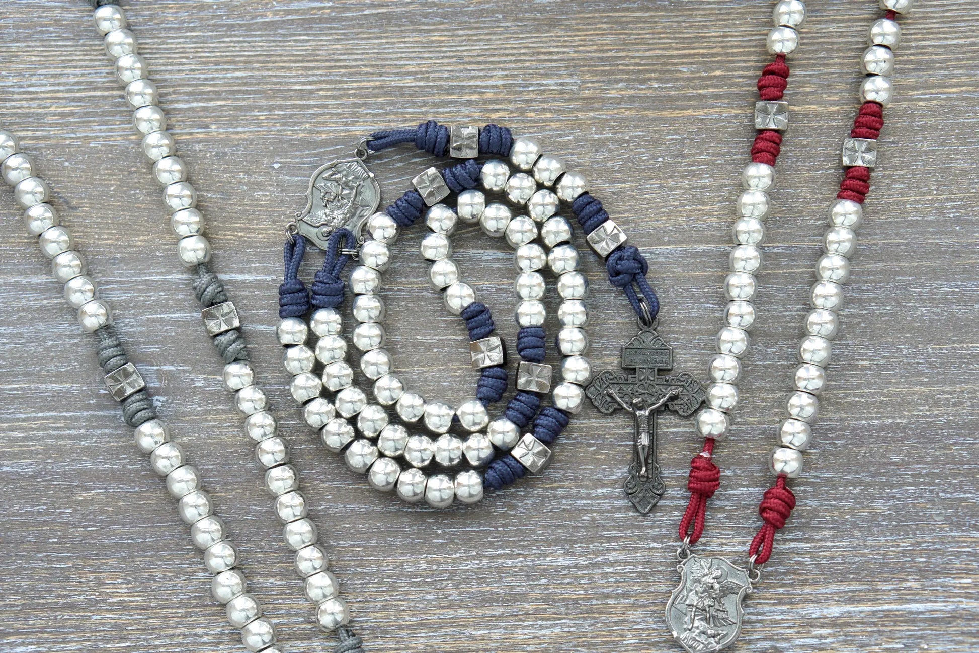 Reclaim Christendom gunmetal and silver metal rosary with available in Iron Gray, Crimson Red or Navy Blue color options.