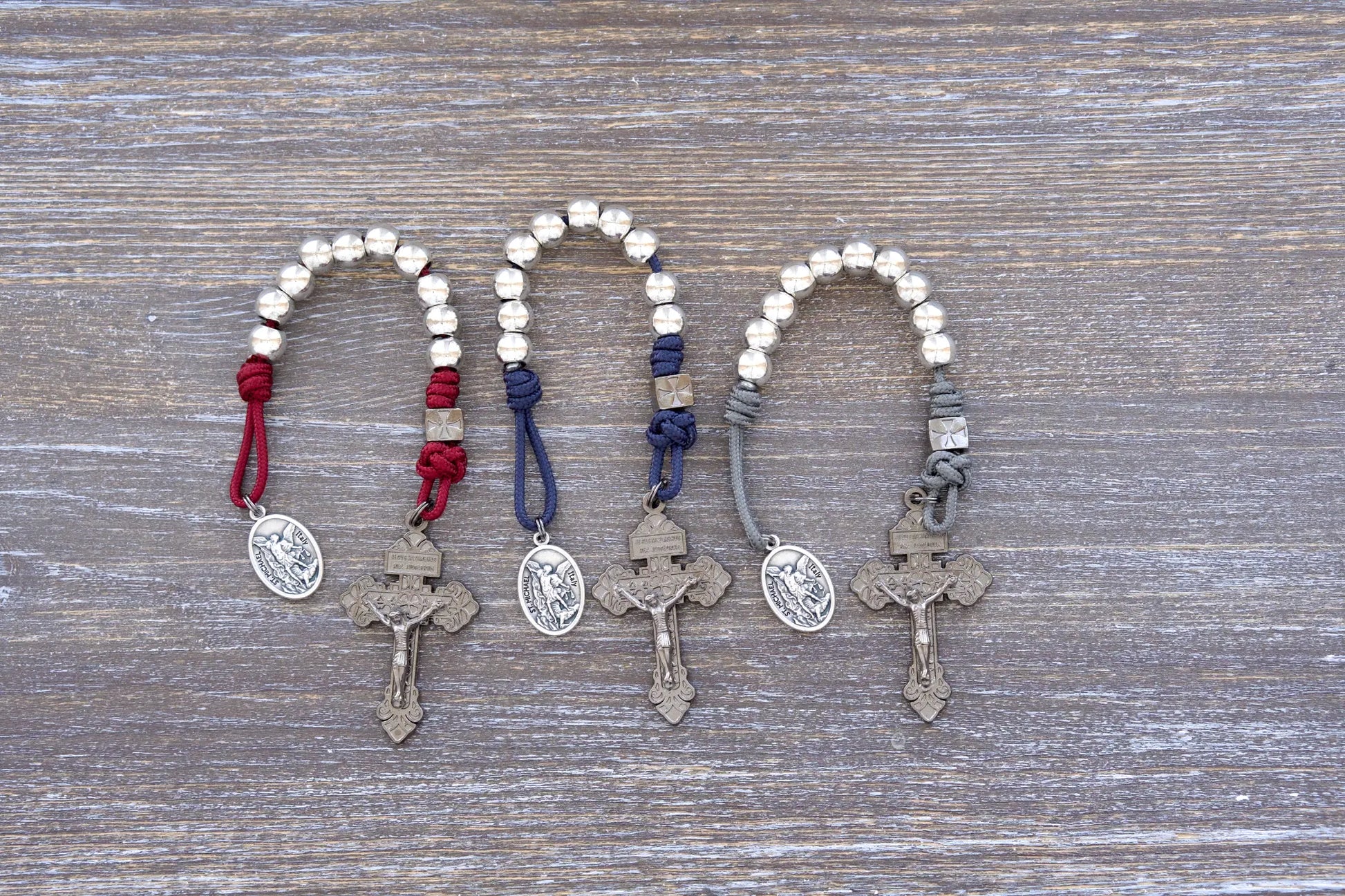 Reclaim Christendom pocket paracord rosary available in three colors, navy blue, maroon or iron gray.