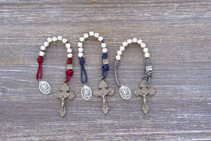 Reclaim Christendom pocket paracord rosary available in three colors, navy blue, maroon or iron gray.