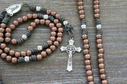 St. Michael's Sword Premium Metal Paracord Rosary with silver Our Father, copper Hail Mary beads, and a 2" St. Benedict crucifix for spiritual protection and devotion.