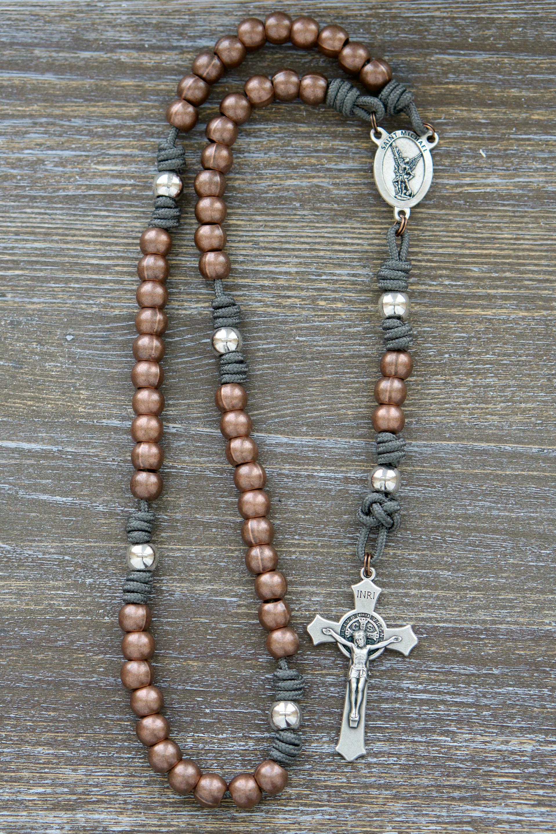 St. Michael's Sword - Premium Metal Paracord Rosary with grey paracord, silver Our Father and copper Hail Mary beads, silver St. Michael centerpiece and St. Benedict crucifix.