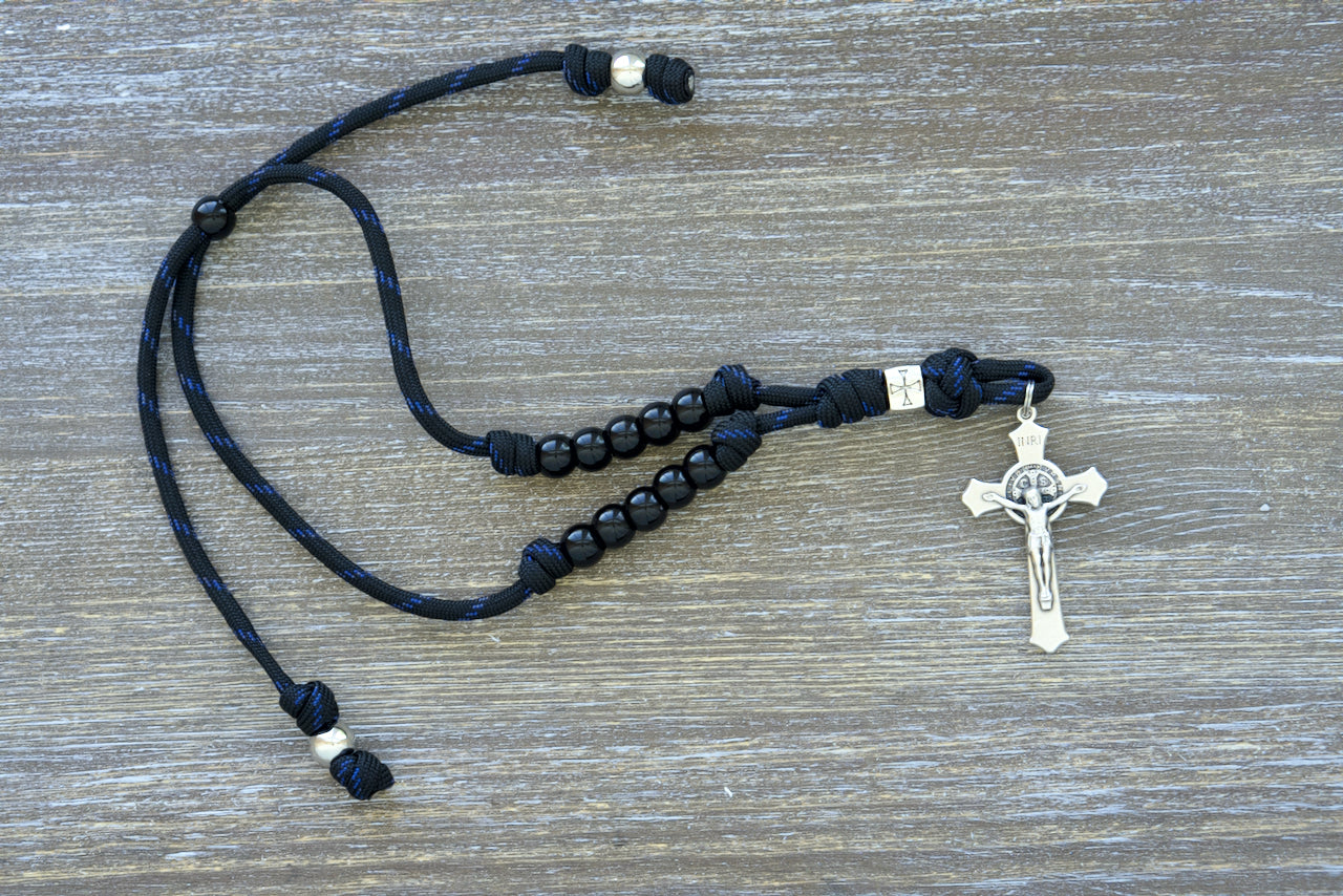 Solemn Crusader - Rearview Mirror Rosary, featuring a stunning 9-inch long paracord rosary with 10 Hail Mary beads, one Our Father bead, and a silver St. Benedict crucifix for on-the-go Catholic prayer and protection.