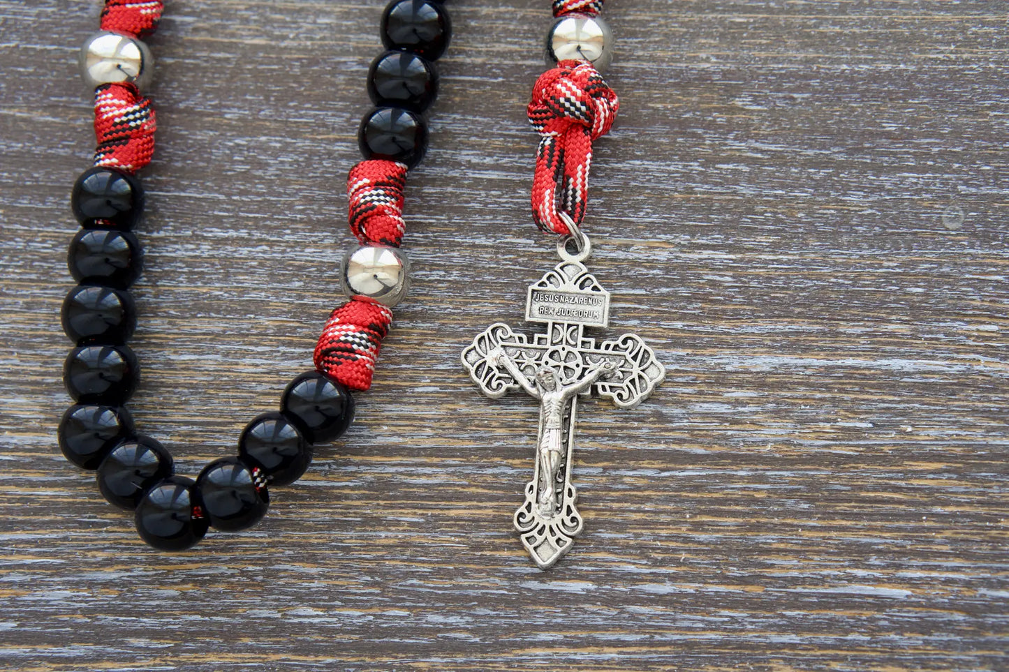 Handcrafted firefighter rosary with smooth 12mm black beads, dedicated to St. Florian's protection.