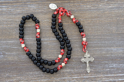 12mm black bead rosary with silver accents, a symbolic tribute to firefighters and first responders' service.