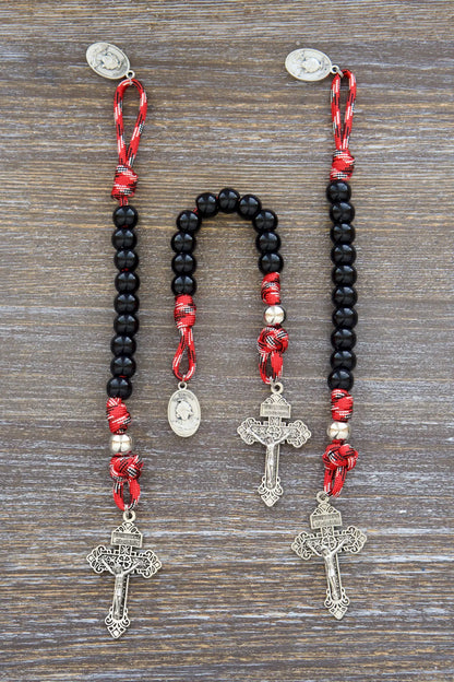 Symbolic firefighter gift: Silver St. Florian medal rosary crafted from strong paracord, representing resilience and faith.