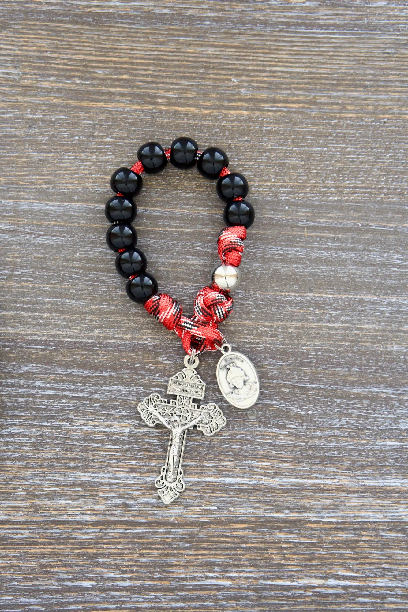 Premium quality fire fighter rosary with silver St. Florian medal, ideal for prayer and invoking protection during emergencies.