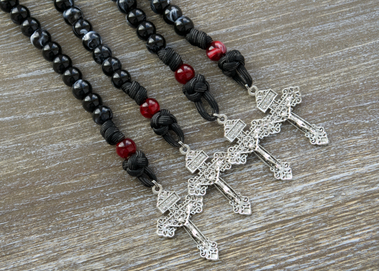 Protect yourself and loved ones with the powerful "Terror of Demons" St. Joseph - Black and Red 1 Decade Paracord Rosary, a durable and unbreakable spiritual weapon in your fight against evil forces.