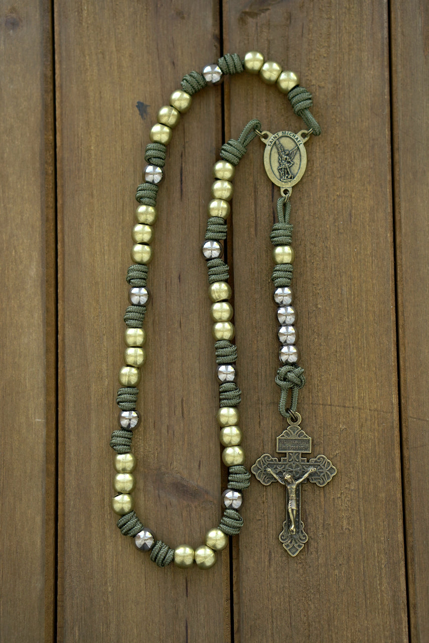 St. Michael Chaplet - Handmade olive and gunmetal paracord chaplet featuring an olive Crucifix, Hail Mary beads, a striking St. Michael centerpiece, and durable Army Green paracord construction.