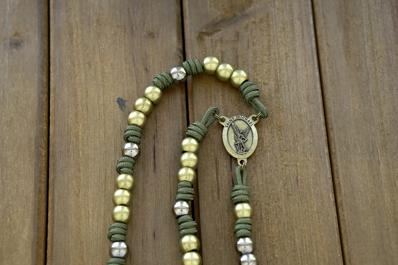 Handmade Army Green paracord St. Michael Chaplet featuring olive Hail Mary beads, gunmetal Our Father beads, an olive wood St. Michael centerpiece and a 2-inch olive Pardon crucifix.  