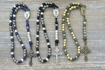 Black, blue, or green paracord chaplet with silver St. Michael medal centerpiece and 10mm metal alloy beads.  