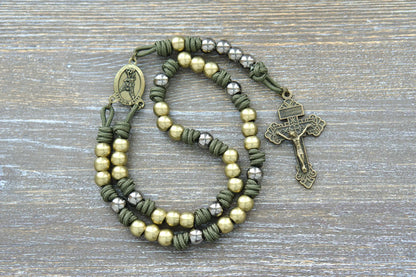 St. Michael chaplet featuring green paracord, 10mm olive metal beads, and a St. Michael medal centerpiece and pardon crucifix