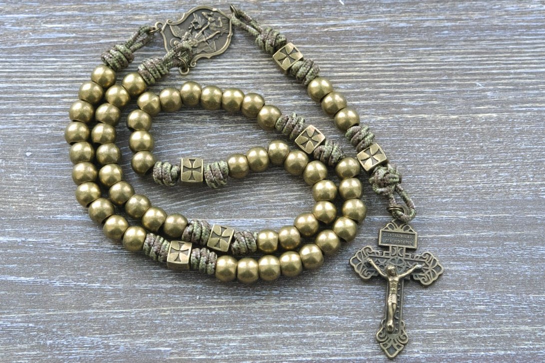 Strength of the Militant Holy Rosary - Durable olive green camo paracord 275 rosary with metal beads, St. Michael devotional medal, and pardon crucifix for Catholic faith defenders.