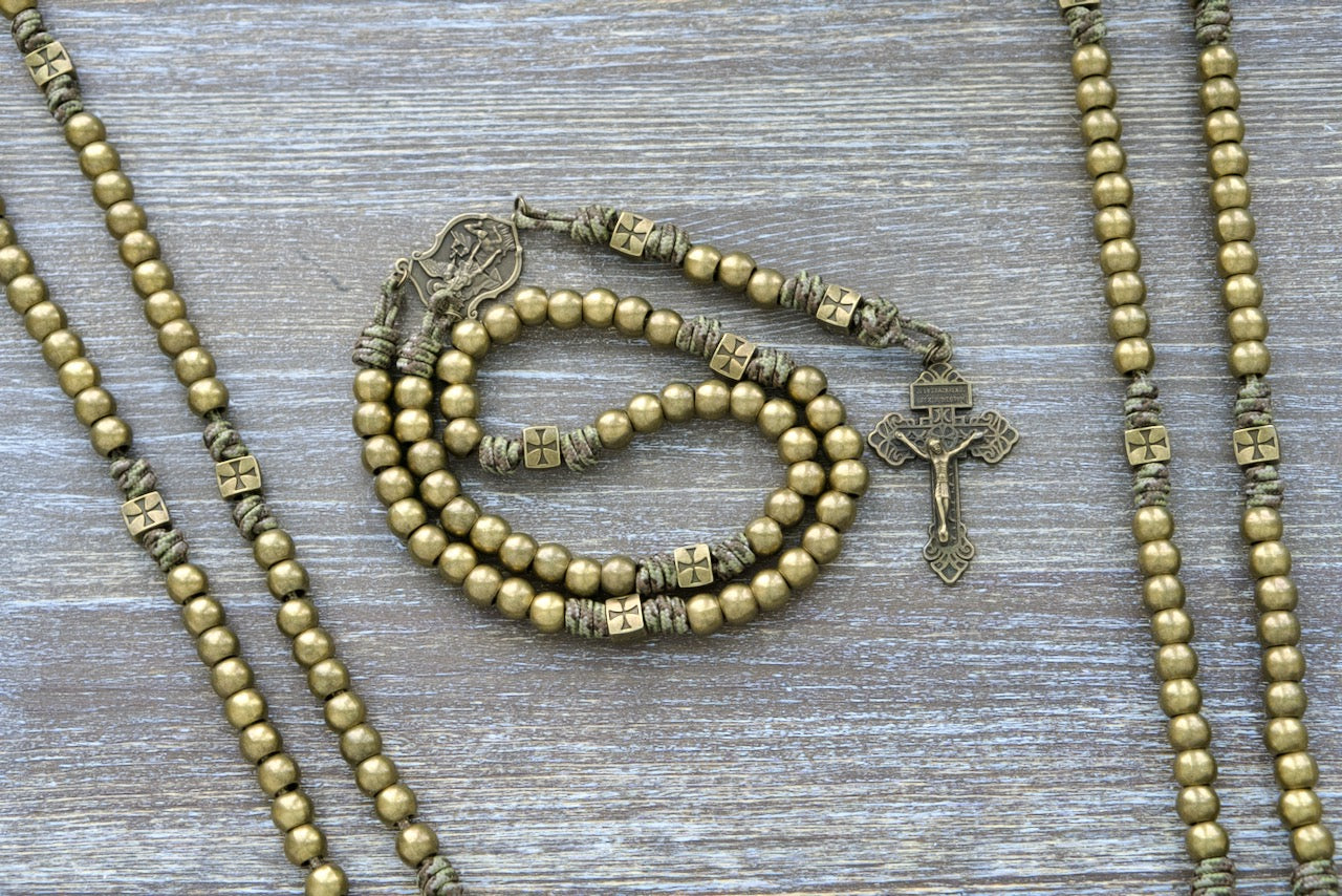 Strength of the Militant Holy Rosary - Premium Metal Paracord Rosary, featuring resilient olive green camo paracord, durable metal alloy beads, St. Michael devotional medal and a 2-inch pardon crucifix.