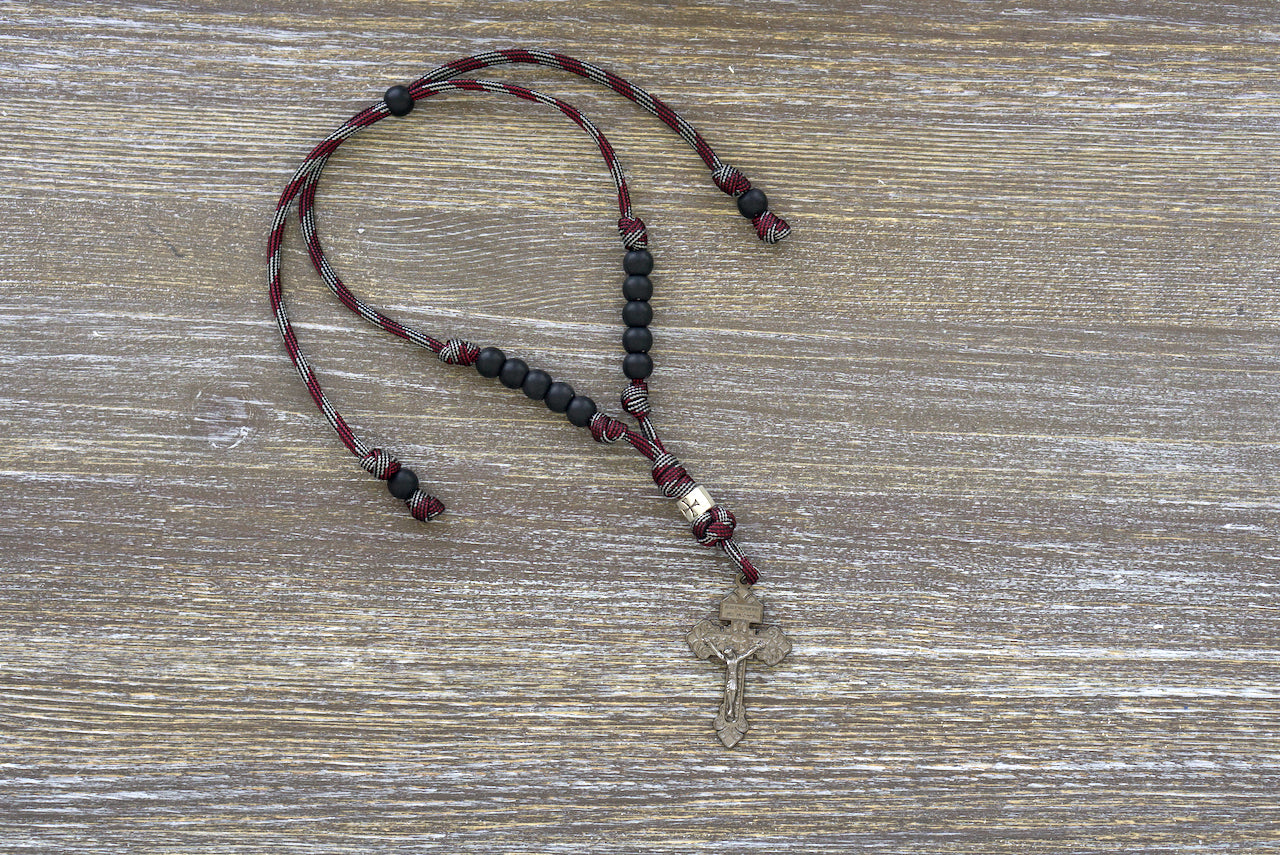 Crusader Rearview Mirror Rosary: Strengthen your faith on-the-go with our handmade paracord rosary designed for easy car use, featuring a metal Crusader bead, 10mm acrylic beads, and an eye-catching gunmetal Pardon Crucifix.