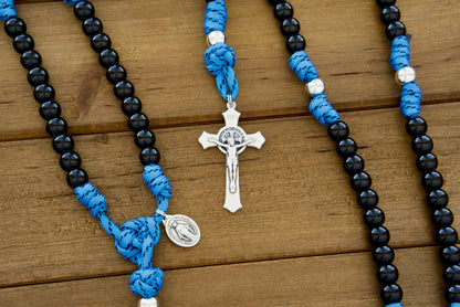The Royal Warrior | Blue, Black & Silver | 5 Decade Paracord Rosary - Durable, premium Catholic rosary with royal blue paracord, black acrylic beads, silver Our Father beads, kids-sized Miraculous Medal and St. Benedict Crucifix for young boys' spiritual journey.